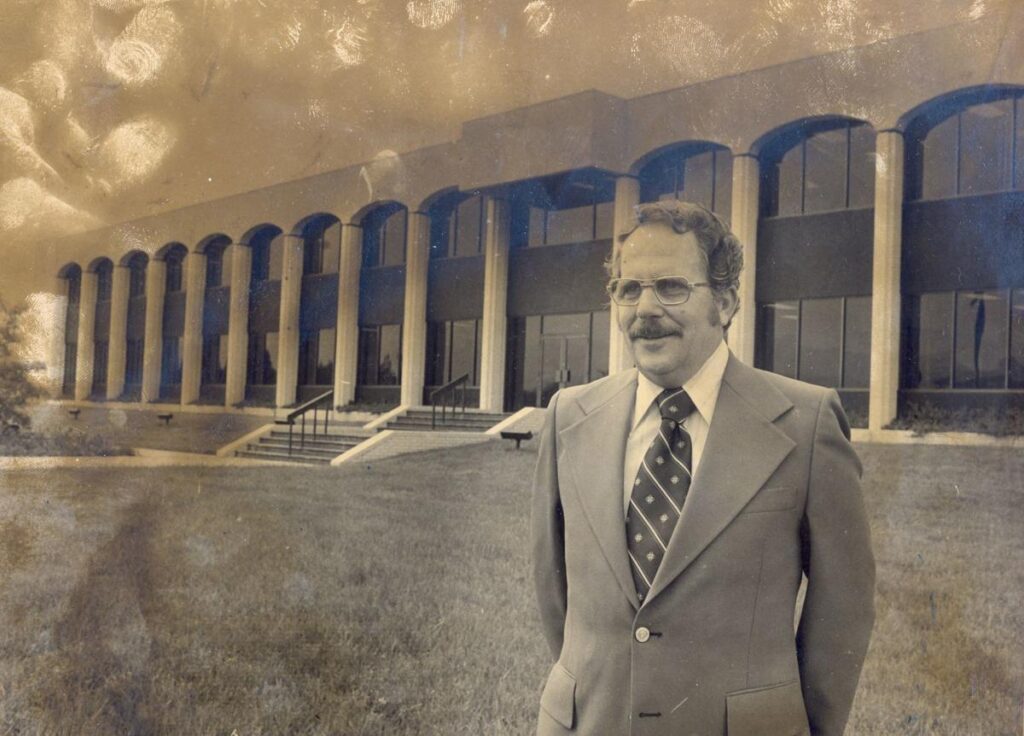 Roy Oliver in front of Medeco headquarters, 1977.