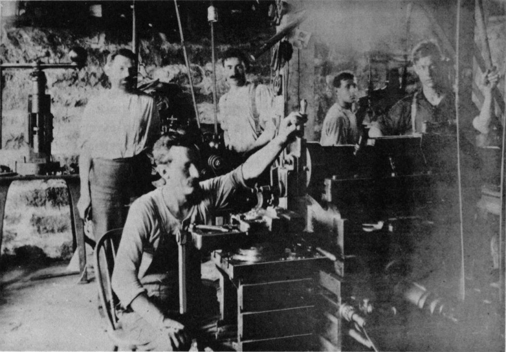 1917. Morris Falk and employees in first Independent Lock Company factory at Leominster, Mass. (Morris Falk, top center)
